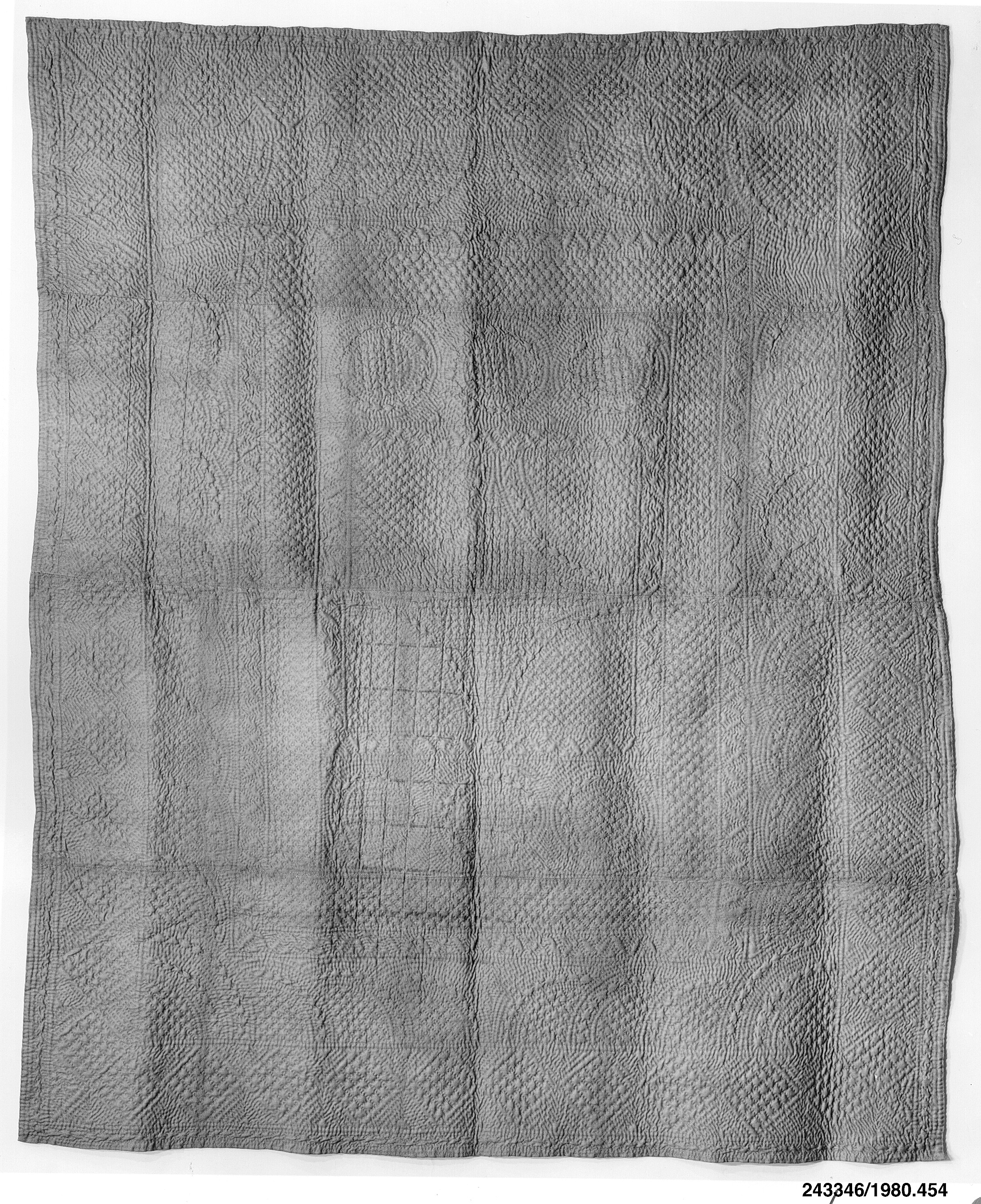 How to Care for and Display Antique Quilts (And Why They Belong on the Bed)